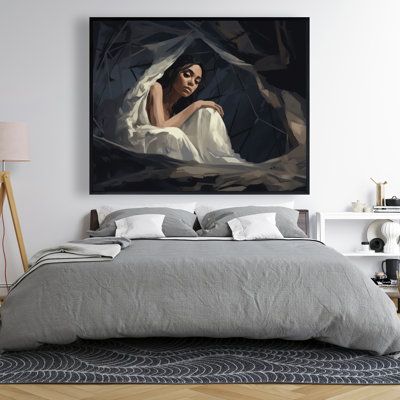 Apartment bedroom decorated with large statement artwork that reflects the homeowner's personality.