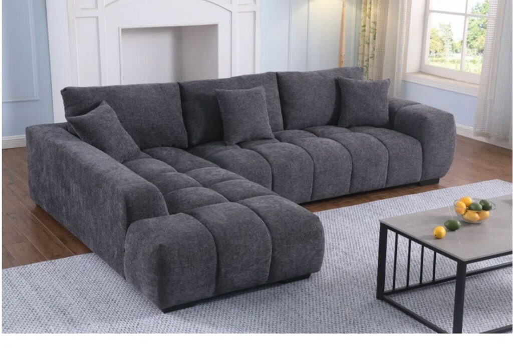Modern living room with furniture arranged away from the walls to create better balance, flow, and a more spacious feel.
