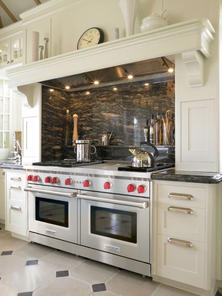 Functional luxury kitchen with organized work zones and efficient storage solutions.