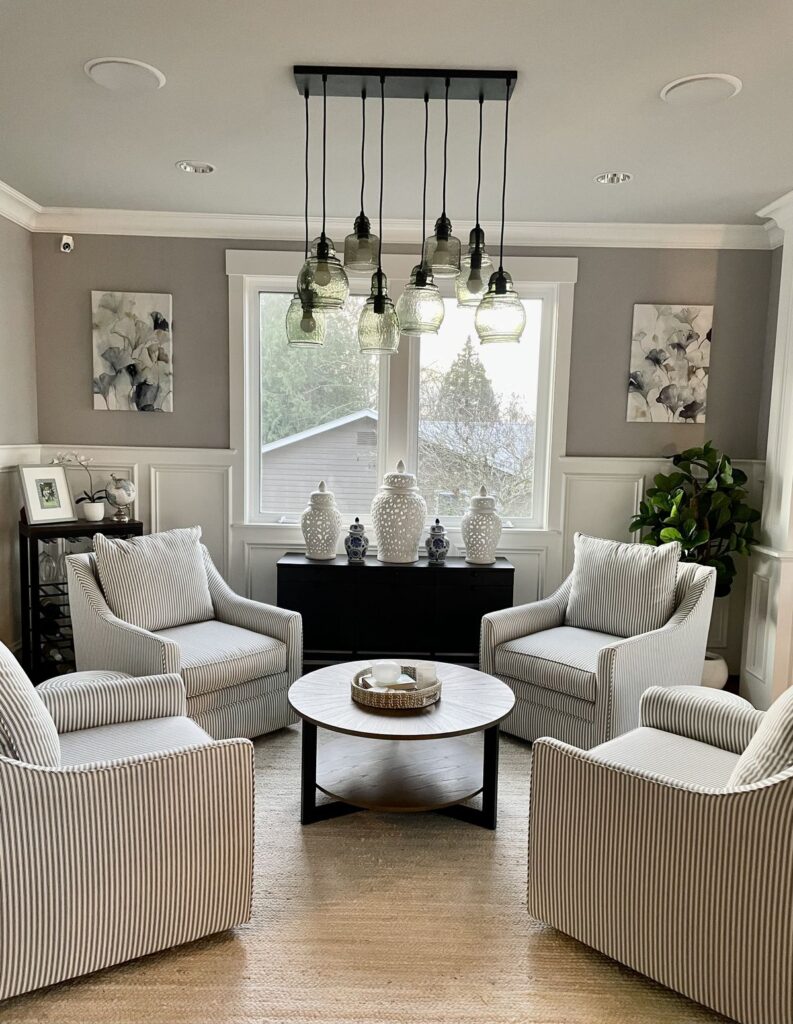  generous spacing between furniture creating an open, airy atmosphere.