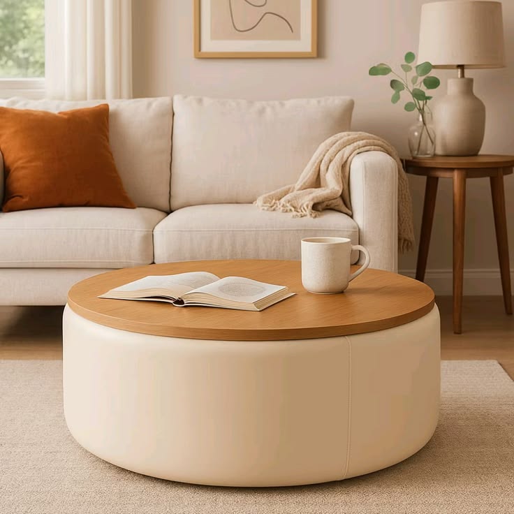 Luxury small living room with a stylish upholstered storage ottoman serving as a coffee table and extra seating.
