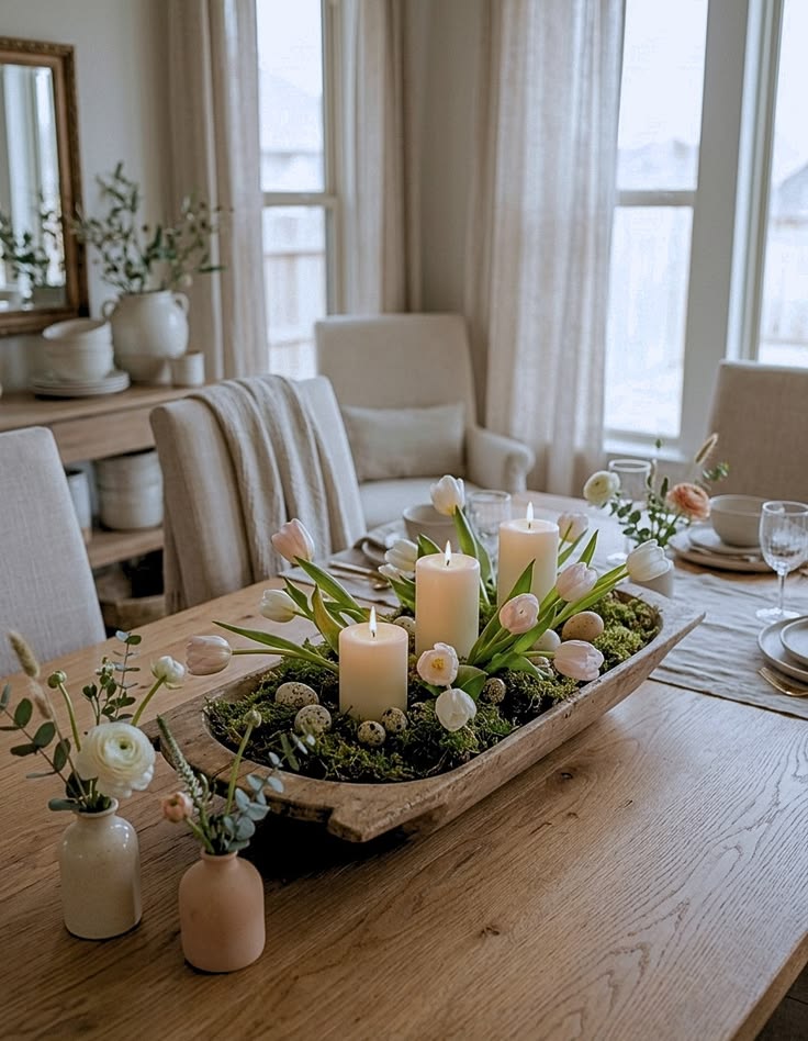 Kitchen dining table featuring a ceramic bowl and fresh flowers as a centerpiece.